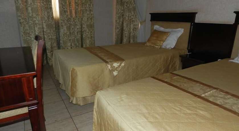 Imagen de la habitación del Hotel Crown Jakiba. Foto 15