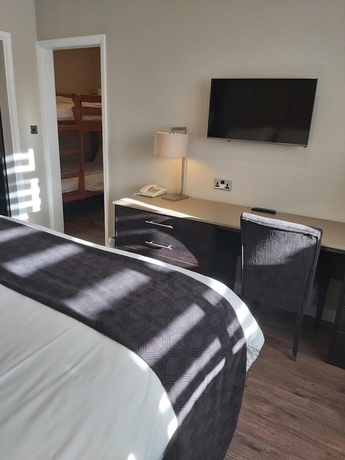 Imagen de la habitación del Hotel Crown Lodge. Foto 12