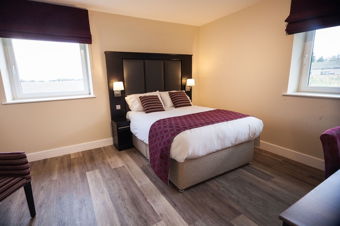 Imagen de la habitación del Hotel Crown Lodge. Foto 13