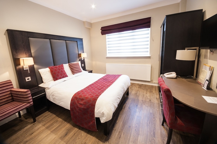 Imagen de la habitación del Hotel Crown Lodge. Foto 15