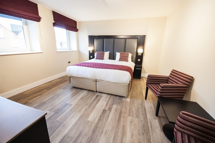 Imagen de la habitación del Hotel Crown Lodge. Foto 17