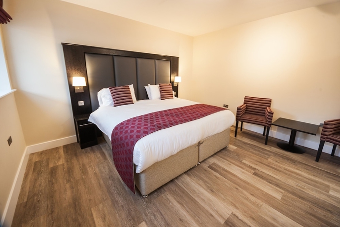 Imagen de la habitación del Hotel Crown Lodge. Foto 18