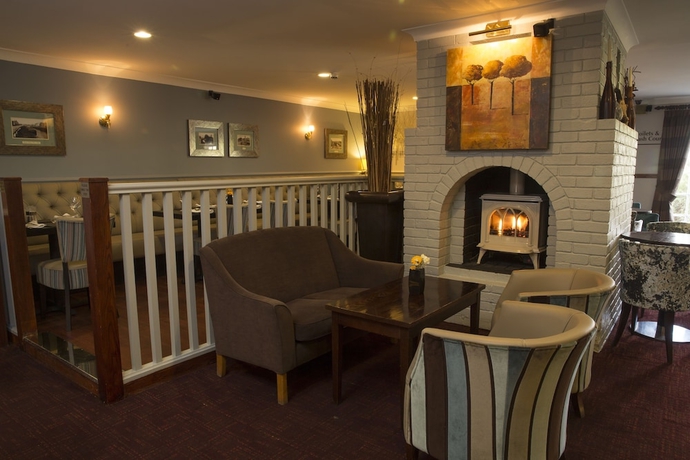 Imagen del bar/restaurante del Hotel Crown Lodge. Foto 3