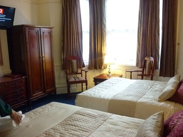 Imagen de la habitación del Hotel Crown Lodge Guest House. Foto 5