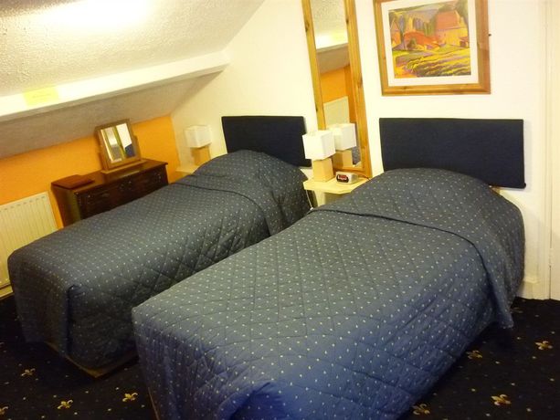 Imagen de la habitación del Hotel Crown Lodge Guest House. Foto 6