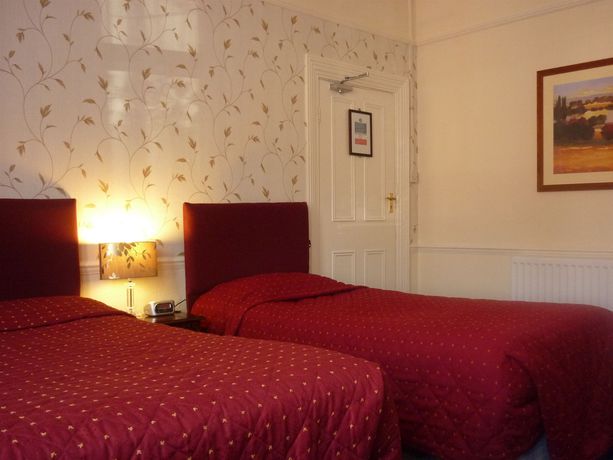 Imagen de la habitación del Hotel Crown Lodge Guest House. Foto 9