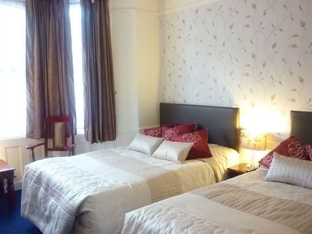 Imagen de la habitación del Hotel Crown Lodge Guest House. Foto 10