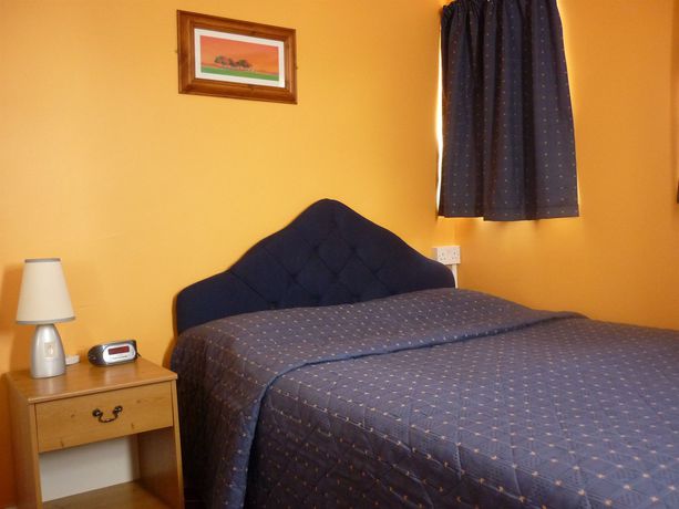 Imagen de la habitación del Hotel Crown Lodge Guest House. Foto 14