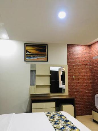 Imagen de la habitación del Hotel Crown Pangandaran Syariah. Foto 19