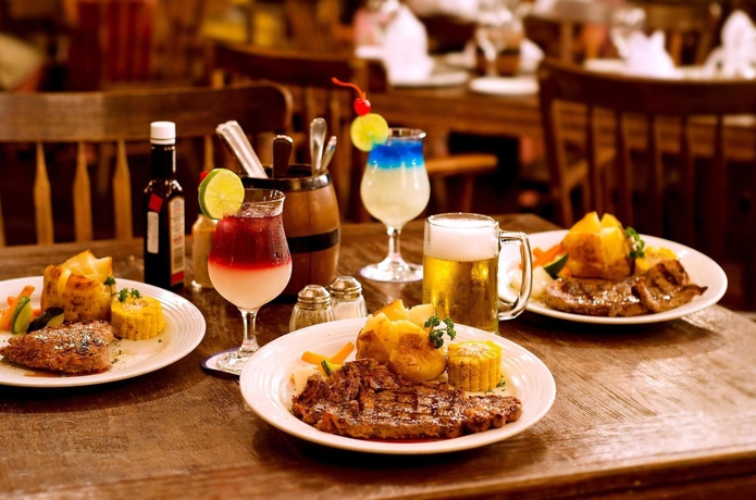 Imagen del bar/restaurante del Hotel Crown Paradise Club Cancun All Inclusive. Foto 23