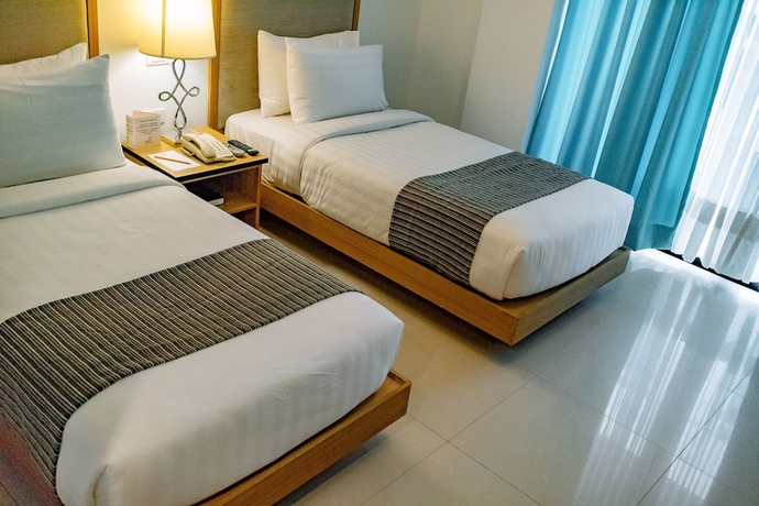 Imagen de la habitación del Hotel Crown Regency Courtyard Resort. Foto 3