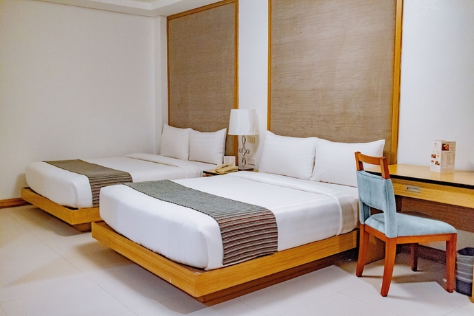 Imagen de la habitación del Hotel Crown Regency Courtyard Resort. Foto 4