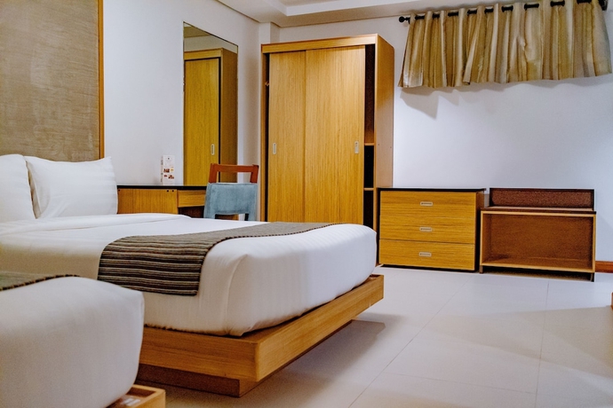 Imagen de la habitación del Hotel Crown Regency Courtyard Resort. Foto 6