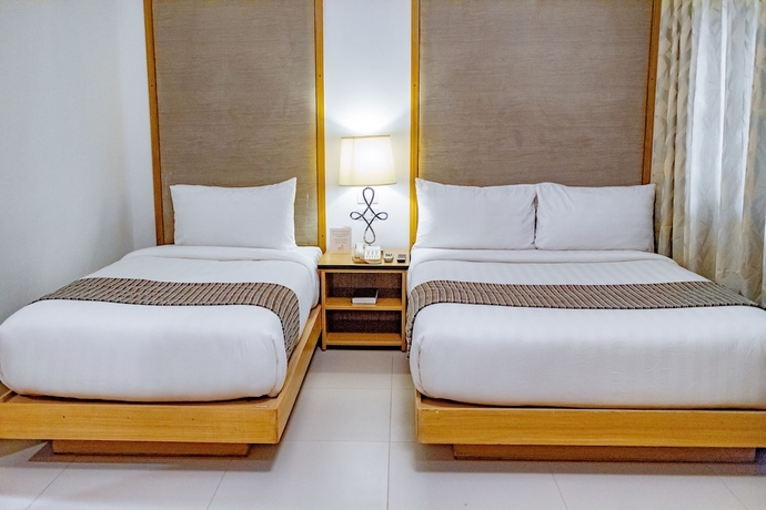 Imagen de la habitación del Hotel Crown Regency Courtyard Resort. Foto 7