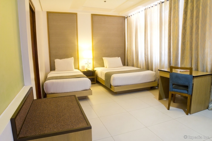 Imagen de la habitación del Hotel Crown Regency Courtyard Resort. Foto 8