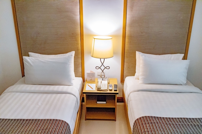 Imagen de la habitación del Hotel Crown Regency Courtyard Resort. Foto 9