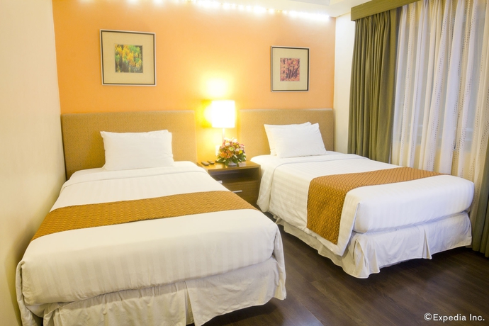 Imagen de la habitación del Hotel Crown Regency Makati. Foto 11