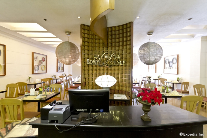 Imagen del bar/restaurante del Hotel Crown Regency Suites and Residences - Mactan. Foto 5
