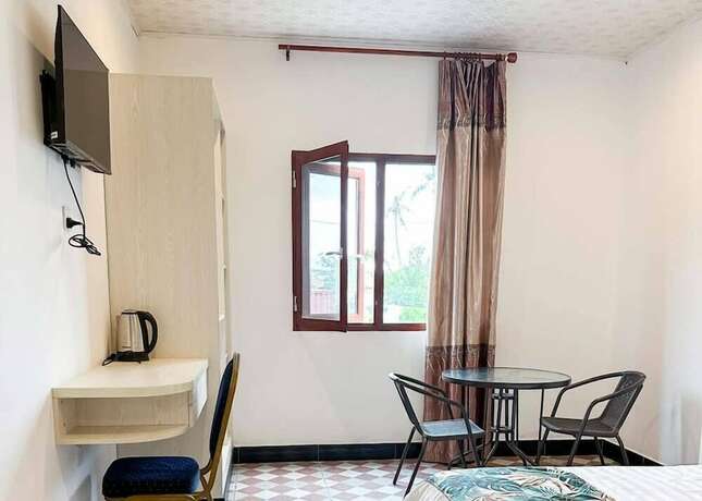 Imagen de la habitación del Hotel Crown Royale and Lounge. Foto 9