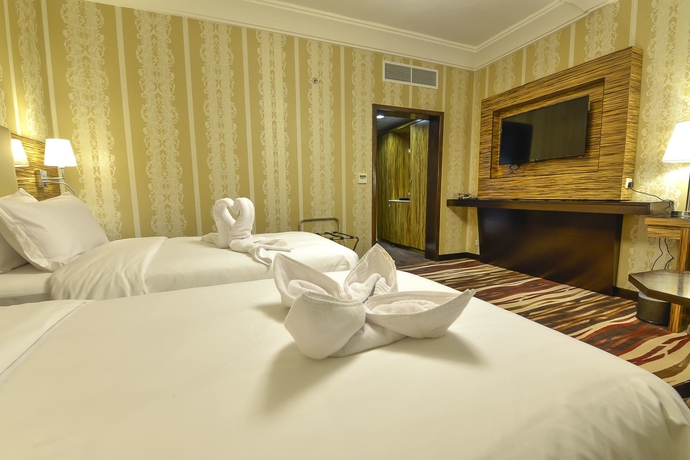 Imagen de la habitación del Hotel Crown Town. Foto 12