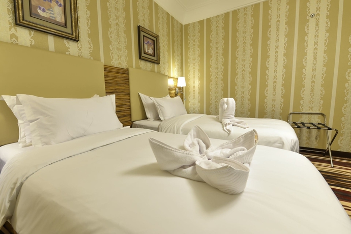 Imagen de la habitación del Hotel Crown Town. Foto 15