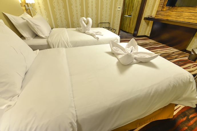 Imagen de la habitación del Hotel Crown Town. Foto 17