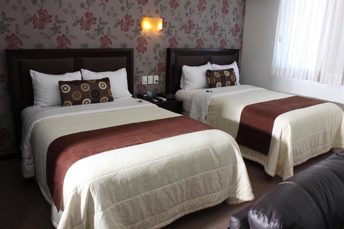 Imagen de la habitación del Hotel Crown Victoria. Foto 11