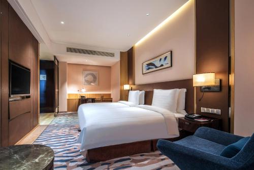 Imagen de la habitación del Hotel Crowne Plaza Dalian Sports Center, An Ihg. Foto 8