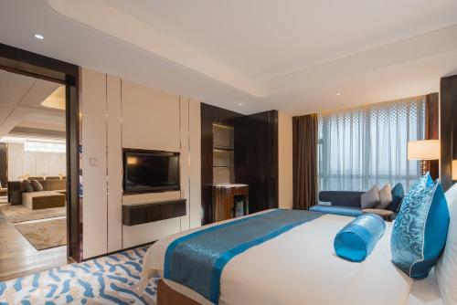 Imagen de la habitación del Hotel Crowne Plaza Dalian Sports Center, An Ihg. Foto 10