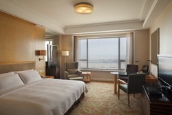 Imagen de la habitación del Hotel Crowne Plaza Dandong. Foto 4