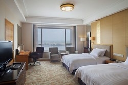 Imagen de la habitación del Hotel Crowne Plaza Dandong. Foto 6
