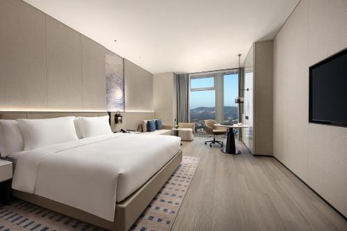 Imagen de la habitación del Hotel Crowne Plaza Jingmen, an IHG. Foto 13