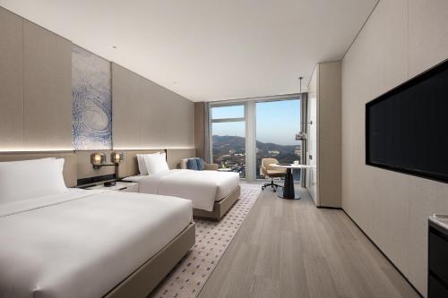 Imagen de la habitación del Hotel Crowne Plaza Jingmen, an IHG. Foto 14