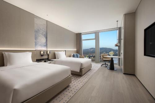 Imagen de la habitación del Hotel Crowne Plaza Jingmen, an IHG. Foto 16