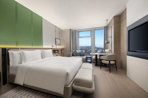 Imagen de la habitación del Hotel Crowne Plaza Jingmen, an IHG. Foto 17