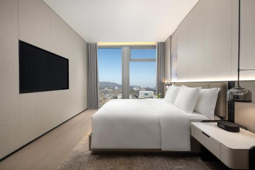 Imagen de la habitación del Hotel Crowne Plaza Jingmen, an IHG. Foto 18