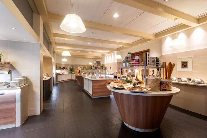 Imagen del bar/restaurante del Hotel Crowne Plaza Paris Marne-la-Vallee by IHG. Foto 4
