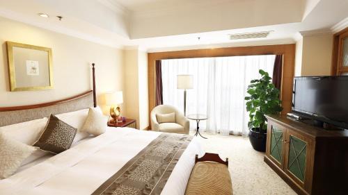 Imagen de la habitación del Hotel Crowne Plaza Qingdao, An Ihg. Foto 4
