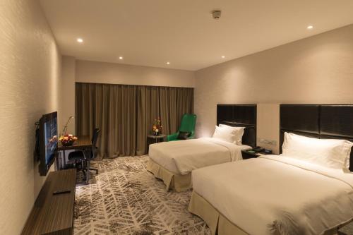 Imagen de la habitación del Hotel Crowne Plaza Shanghai Jinshan. Foto 5
