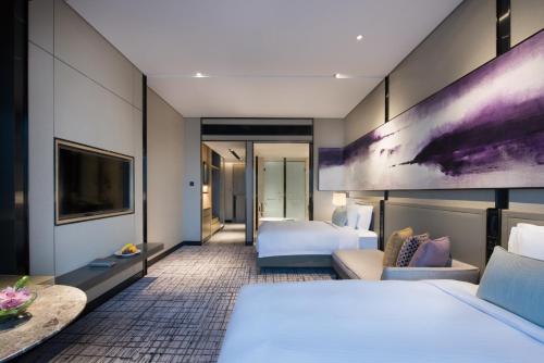 Imagen de la habitación del Hotel Crowne Plaza Shanghai Pujiang, An Ihg. Foto 7