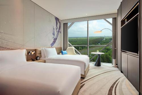 Imagen de la habitación del Hotel Crowne Plaza Shanghai Snow World, an IHG. Foto 14