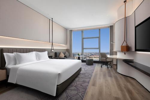 Imagen de la habitación del Hotel Crowne Plaza Taizhou City Center, an IHG. Foto 7
