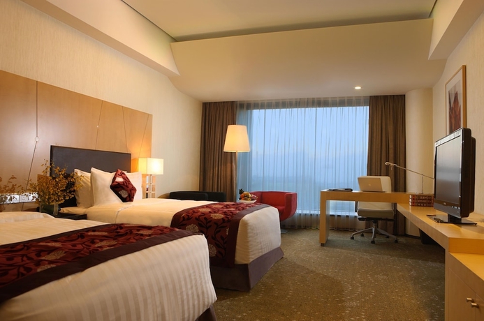 Imagen de la habitación del Hotel Crowne Plaza Tianjin Binhai, An Ihg. Foto 12