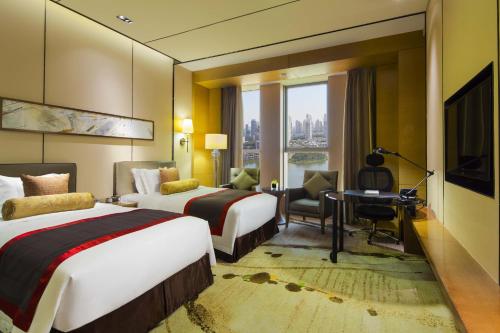 Imagen de la habitación del Hotel Crowne Plaza Tianjin Mei Jiang Nan, An Ihg. Foto 6