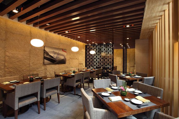 Imagen del bar/restaurante del Hotel Crowne Plaza Zhongshan Wing On City, An Ihg. Foto 2