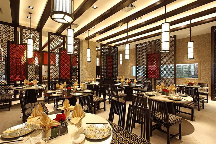 Imagen del bar/restaurante del Hotel Crowne Plaza Zhongshan Wing On City, An Ihg. Foto 3