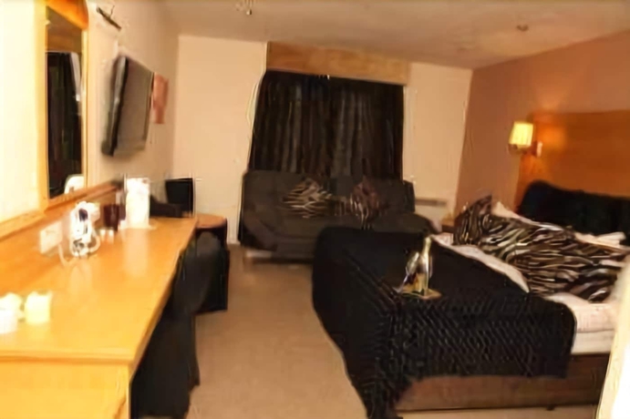 Imagen de la habitación del Hotel Crowwood. Foto 14