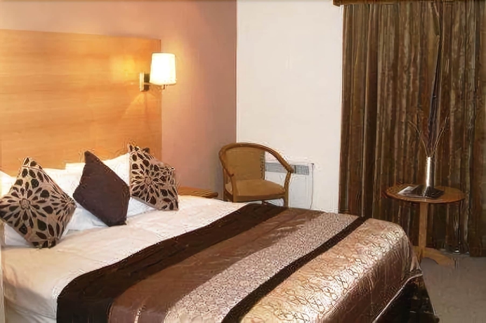 Imagen de la habitación del Hotel Crowwood. Foto 17