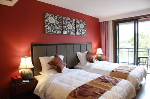 Imagen de la habitación del Hotel Crystal Boutique, xiufeng. Foto 12