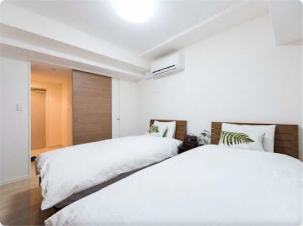 Imagen de la habitación del Hotel Crystal Exe Nipponbashi. Foto 22